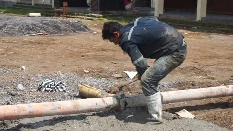 The process of pouring building cement by a group of builders Stock Footage 236637864