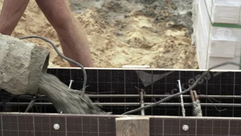 Process of pouring cement or concrete with automatic pump, construction site Stock Footage 170243714