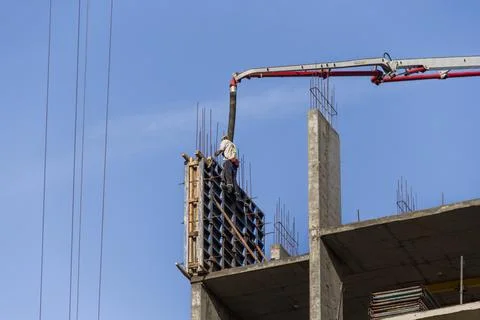 The process of pouring concrete into a structure Stock Photos