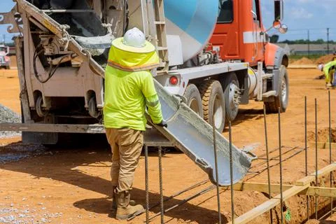 The process of pouring concrete trenches the foundation for house Stock Photos