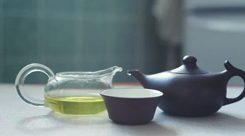 The process of pouring freshly brewed chinese oolong tea Stock Footage 63901280