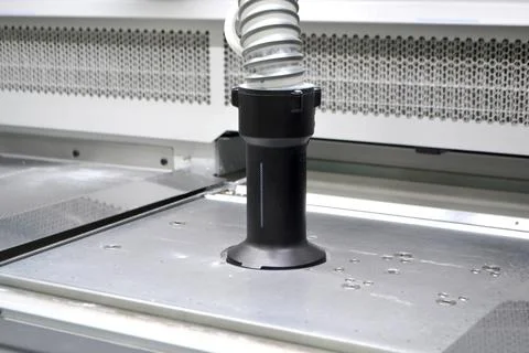 Process of pouring polyamide powder through hose into working chamber 3d printer Stock Photos
