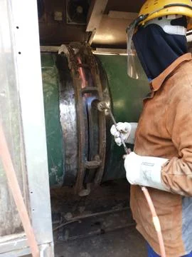 The process of preheating around the weld joint Stock Photos