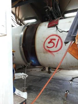 The process of preheating around the weld joint Foto stock