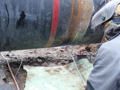 The process of preheating around the weld joint Stock Photos