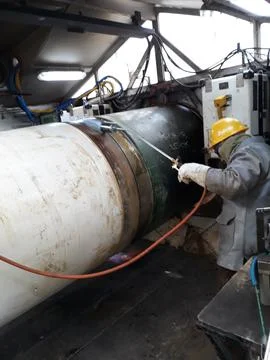 The process of preheating around the weld joint Stock Photos