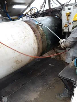 The process of preheating around the weld joint Stock Photos