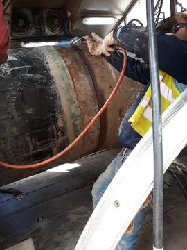 The process of preheating around the weld joint Stock Photos