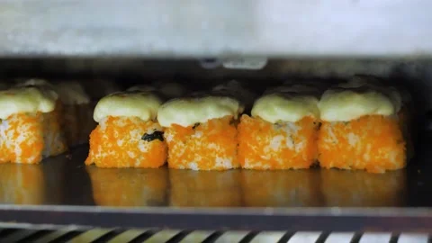 A process of preparation and baking of hot sushi in bake, 4k footage Stock Footage 237506849