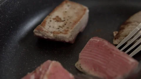 Process of preparation fresh tuna. Roasting fillet of tuna. Slow motion closeup Stock Footage 91655926