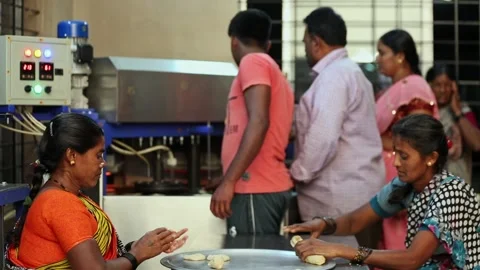 Process of preparation of indian bread or chapati inside the kitchen Stock Footage 229632736