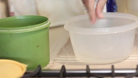 Process to prepare corn cakes or arepas by adding water, salt and corn flour. Stock Footage 306019094