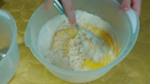 The process of preparing and whipping homemade pastries. Selective Focus Stock Footage 169518129