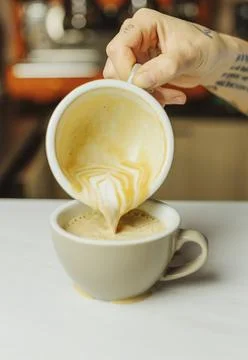 Process of preparing cappuccino on the cafe Stock Photos