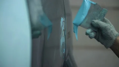 The process of preparing the car for painting. Car repair shop. Stock Footage 85071717
