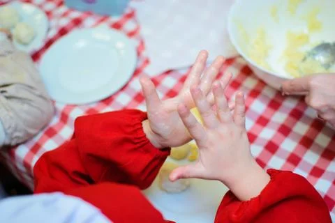 The process of preparing children at school for small cooks Stock Photos