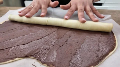 The process of preparing a chocolate pastry with buttery shortcrust dough Video stock 296098488