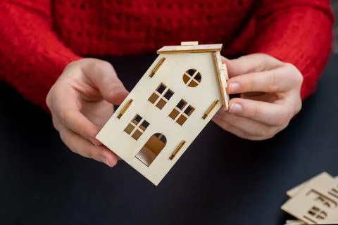 Process of preparing for Christmas and New Year eve. 3D craft wooden house... 스톡 사진