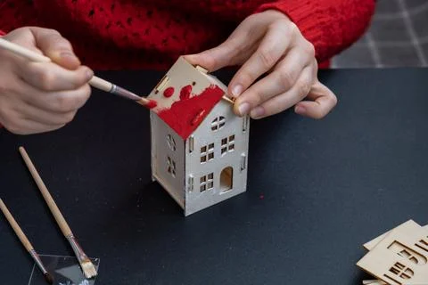 Process of preparing for Christmas and New Year eve. Unrecognizable woman in red Stock Photos