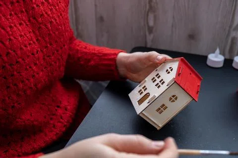 Process of preparing for Christmas and New Year eve. 3D craft wooden houses DIY 스톡 사진