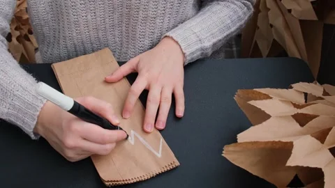 Process of preparing for Christmas star and New Year eve. 3D craft bag Stock Footage 316796463