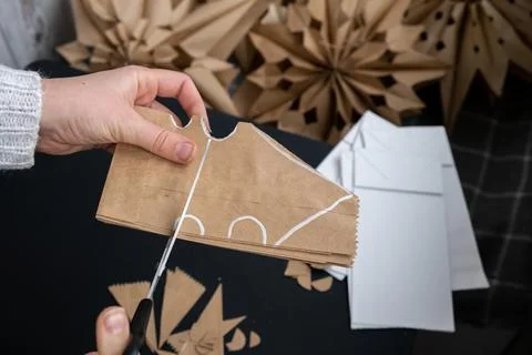 Process of preparing for Christmas star and New Year eve. 3D craft bag Stock Photos