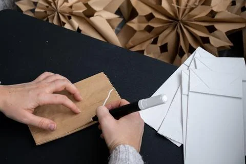 Process of preparing for Christmas star and New Year eve. 3D craft bag Stock Photos