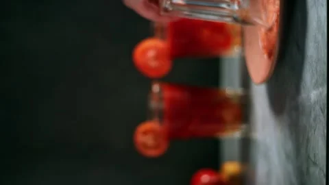 Process of preparing cocktail. Hand pouring glass with beverage. Garnishing Stock Footage 300027898