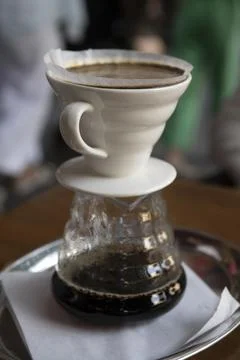 The process of preparing coffee with a filter .close-up of a cup of coffee Stock Photos