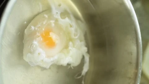 Process of preparing delicious poached egg. Vertical video. Stock Footage 311046133