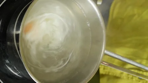 Process of preparing delicious poached egg. Vertical video. Stock Footage 311046149