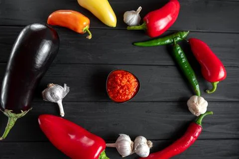 The process of preparing the dish ajvar. Ingredients red pepper, chili pepper Stock Photos