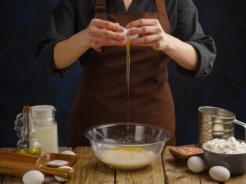 The process of preparing dough for bread, pizza, pie, pasta by a professional Stock Photos