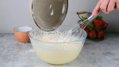 The process of preparing dough. Flour in a bowl Stock Footage 256655656