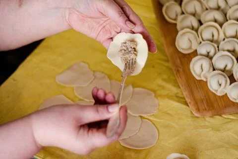 The process of preparing dumplings. Stock Photos