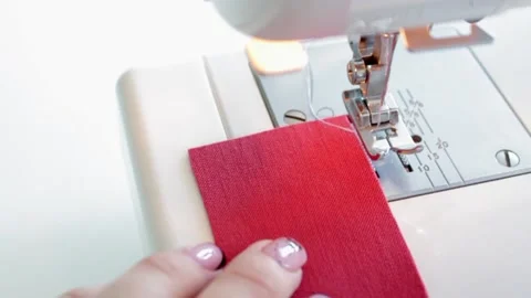 The process of preparing the fabric details for sewing on a sewing machine. Stock Footage 169989558