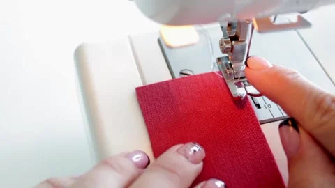The process of preparing fabric parts for sewing on a sewing machine. Stock Footage 169751760