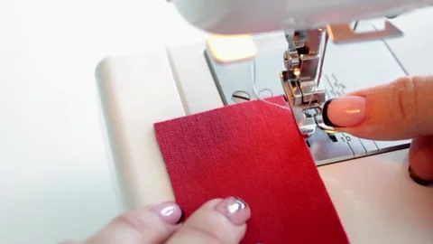 The process of preparing fabric parts for sewing on a sewing machine. Stock Footage 169751788