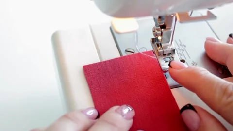 The process of preparing fabric parts for sewing on a sewing machine. Stock Footage 169751807