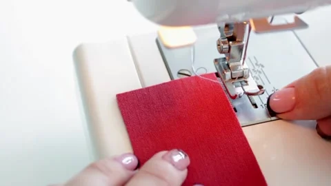 The process of preparing fabric parts for sewing on a sewing machine. Stock Footage 169751875
