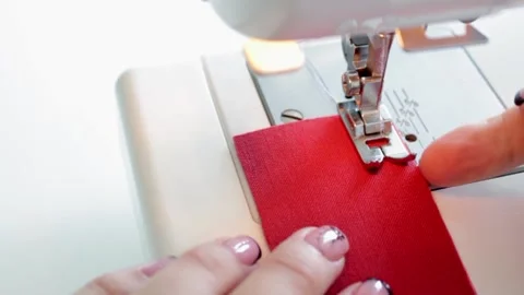 The process of preparing the fabric parts for sewing on a sewing machine. Stock Footage 169989826