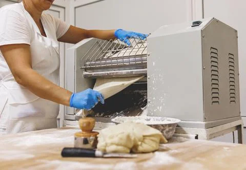 The process of preparing food from dough in the kitchen Stockfoto's