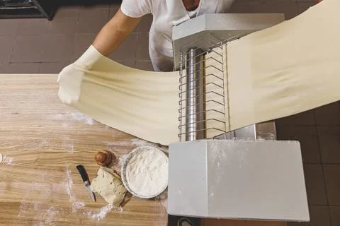 The process of preparing food from dough in the kitchen Stockfoto's