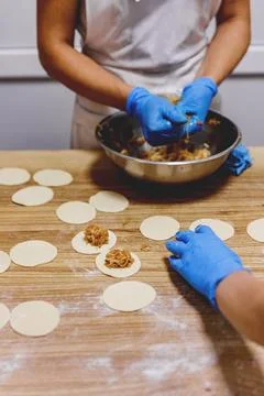 The process of preparing food from dough in the kitchen Stockfoto's