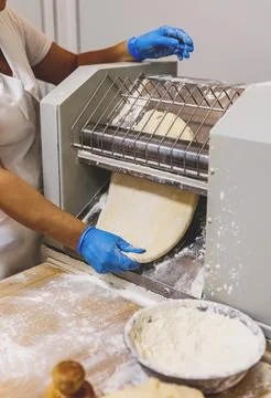 The process of preparing food from dough in the kitchen Stockfoto's