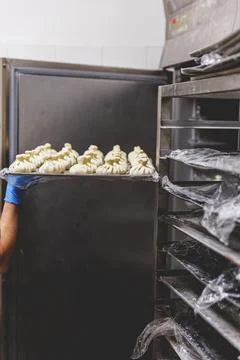 The process of preparing food from dough in the kitchen Stockfoto's