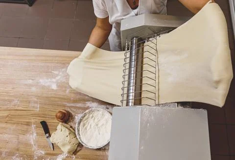 The process of preparing food from dough in the kitchen Stockfoto's