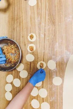The process of preparing food from dough in the kitchen Stockfoto's