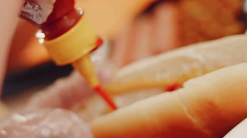 Process of preparing Irresistible chili cheese Hot Dogs. Taste USA cuisine witch Stock Footage 231548431