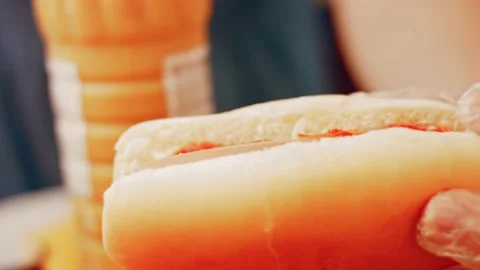 Process of preparing Irresistible chili cheese Hot Dogs. Taste USA cuisine witch Stock Footage 231548593